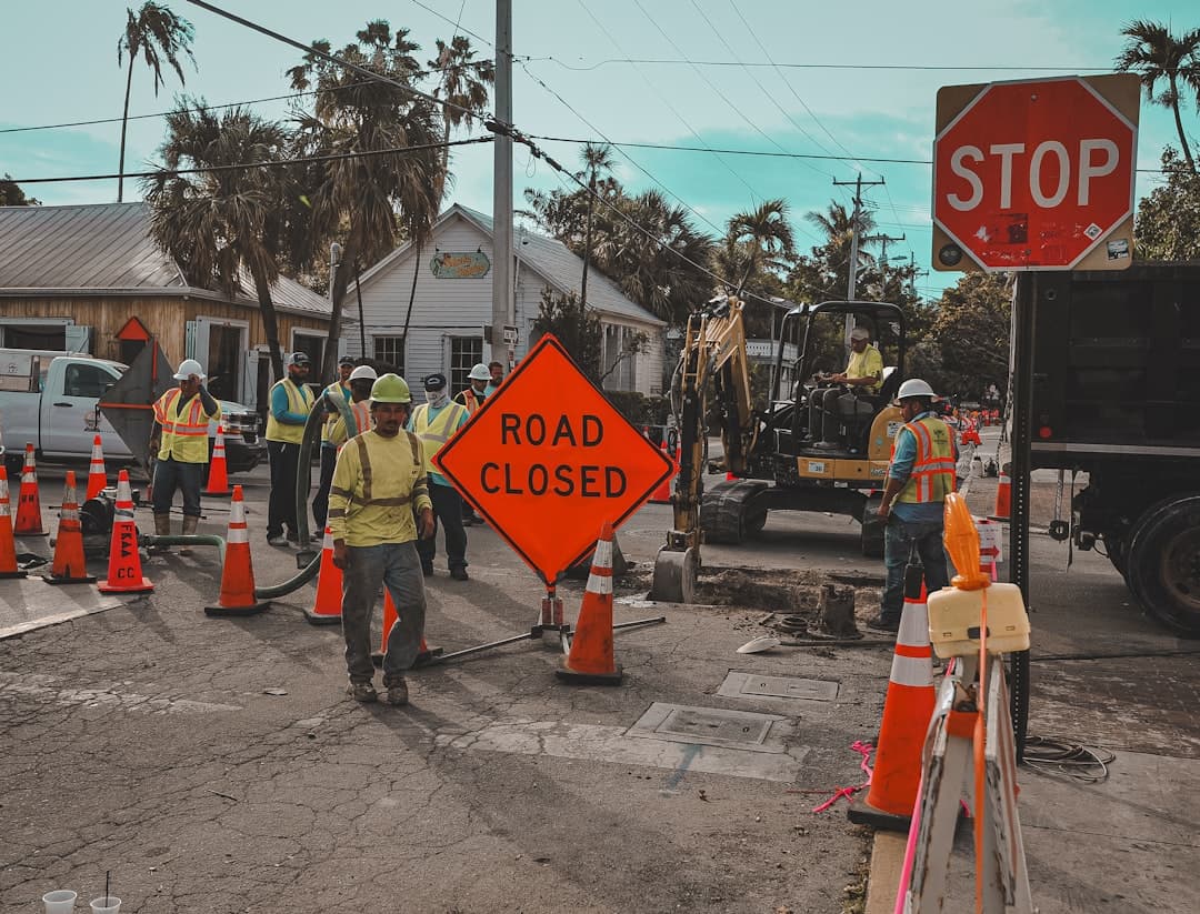 Construction workers and contractors collaborating on a building project