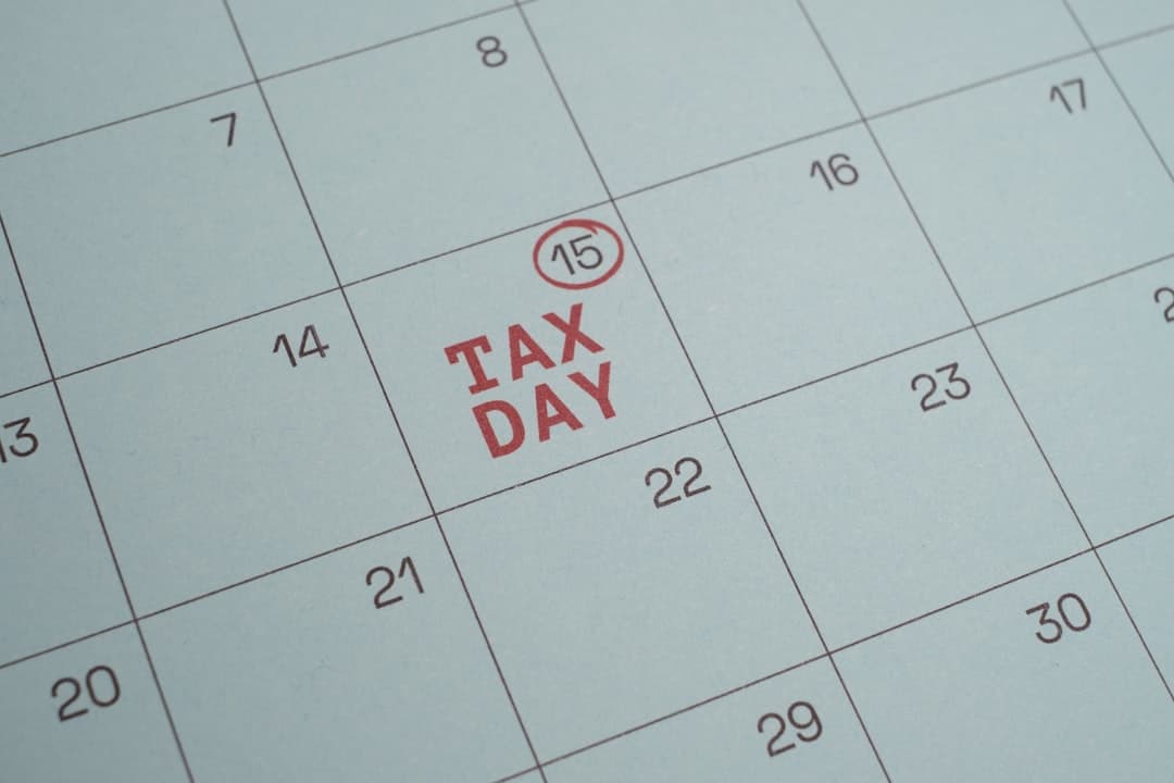 Business calendar and tax documents on desk showing planning timeline